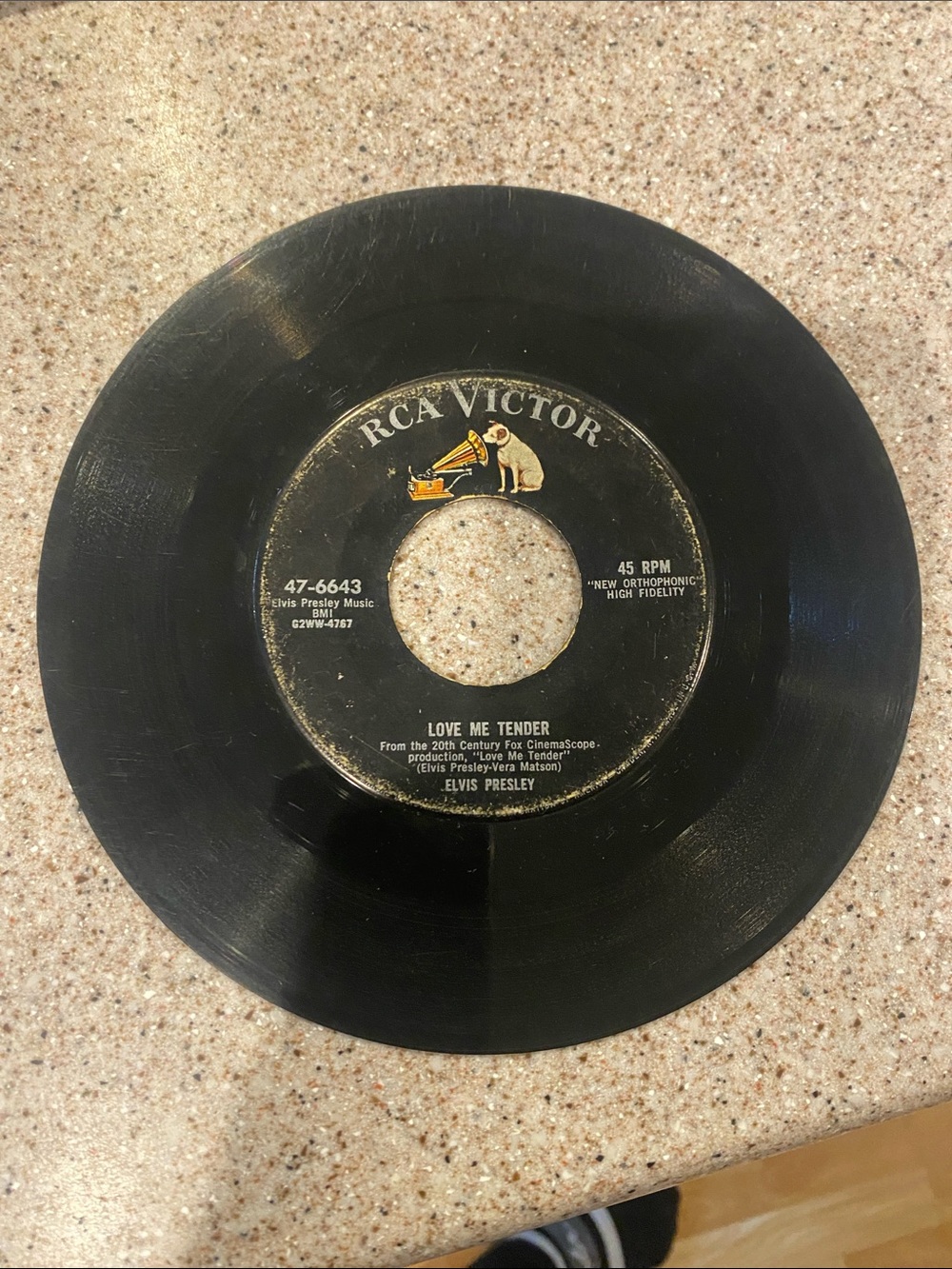 Elvis 45 Love Me Tender and Anyway You Want Me.